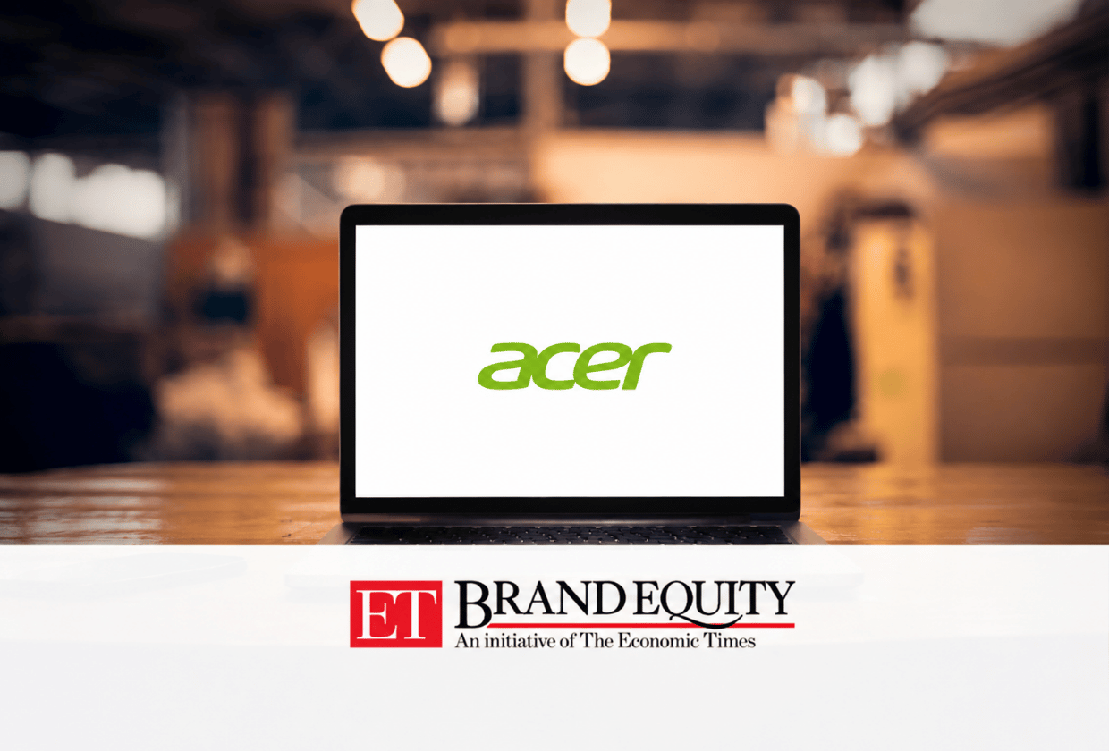 Laptop displaying the Acer logo on a desk in a blurred office setting, with ET Brand Equity branding featured in a white banner at the bottom.