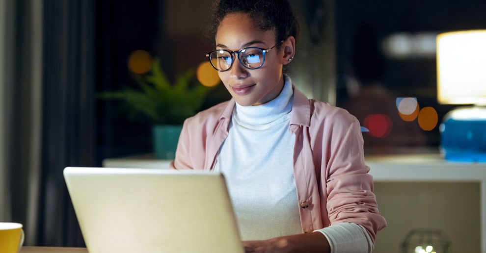 ShotOfPrettyHappyYoungEntrepreneurWomanWorkingWithLaptop #image_title